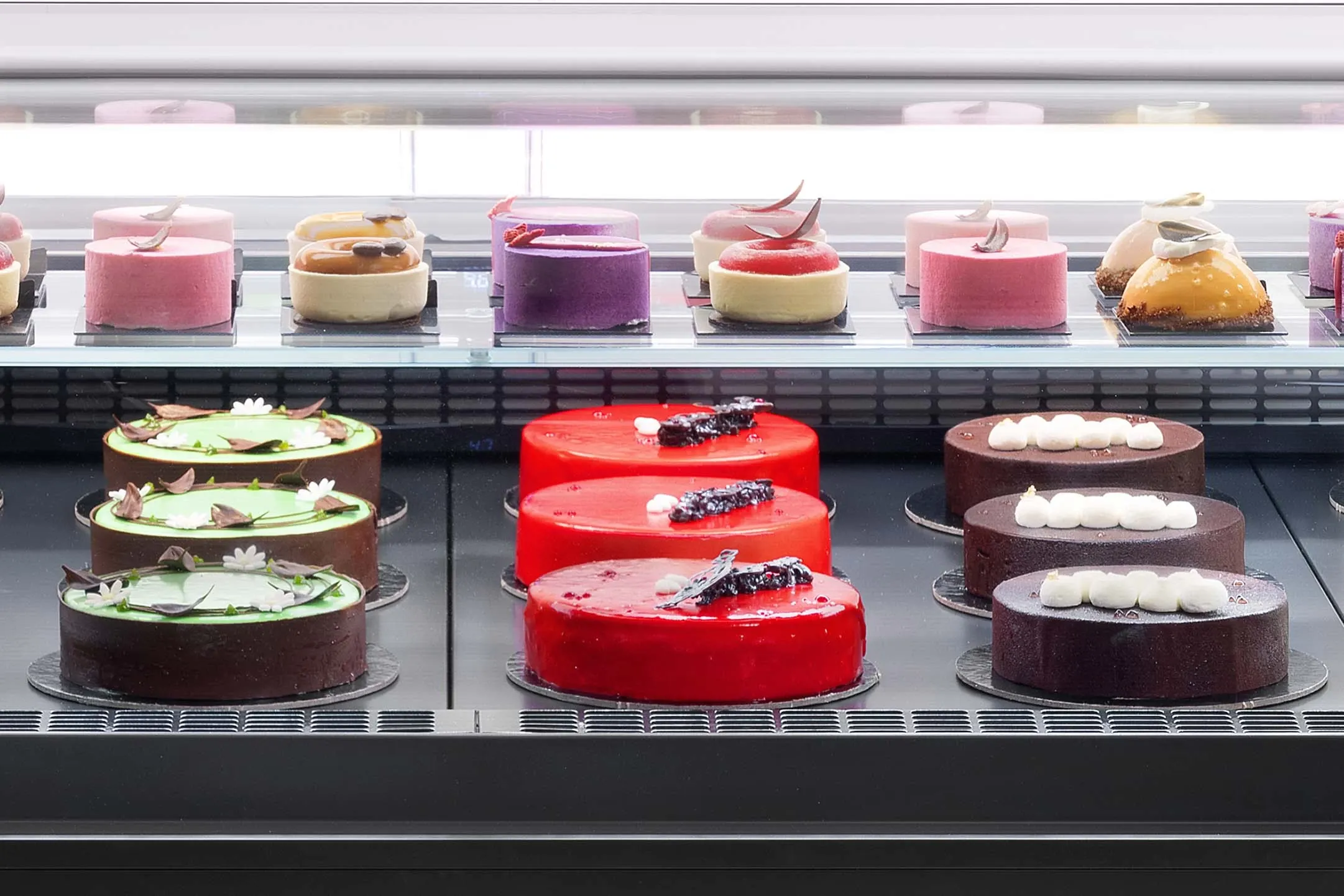 Desserts Displayed attractively in a ftemperature controlled food display copnyter